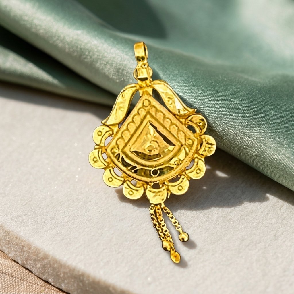 locket (13) Teardrop Gold Locket - Image 1